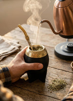 Load image into Gallery viewer, Hot water being poured into the black torpedo mate gourd with engraved gold rim