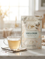 Load image into Gallery viewer, Brewed cup of Vanilla Dream tea beside the package in a bright airy kitchen