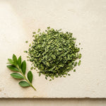 Load image into Gallery viewer, Flat-lay of De Oro Reserve's single pure ingredient: loose green yerba mate