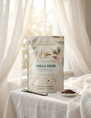 Vanilla Dream tea package in a dreamy white-gold bedroom scene